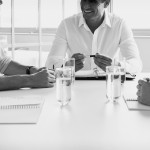 bigstock Smiling business people in mee 96690950 BW e1456197755817